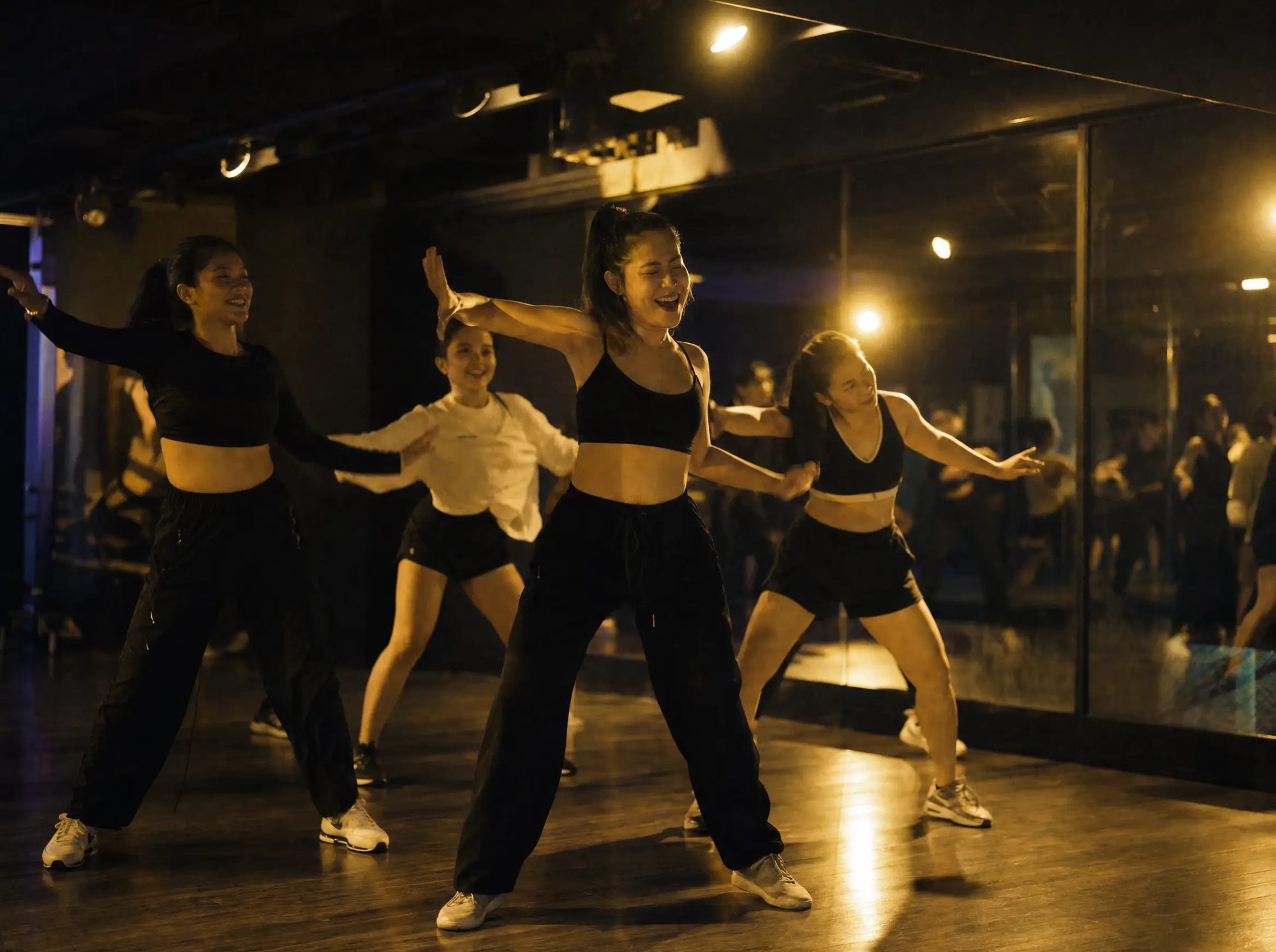 Dance fitness session in the mirrored studio